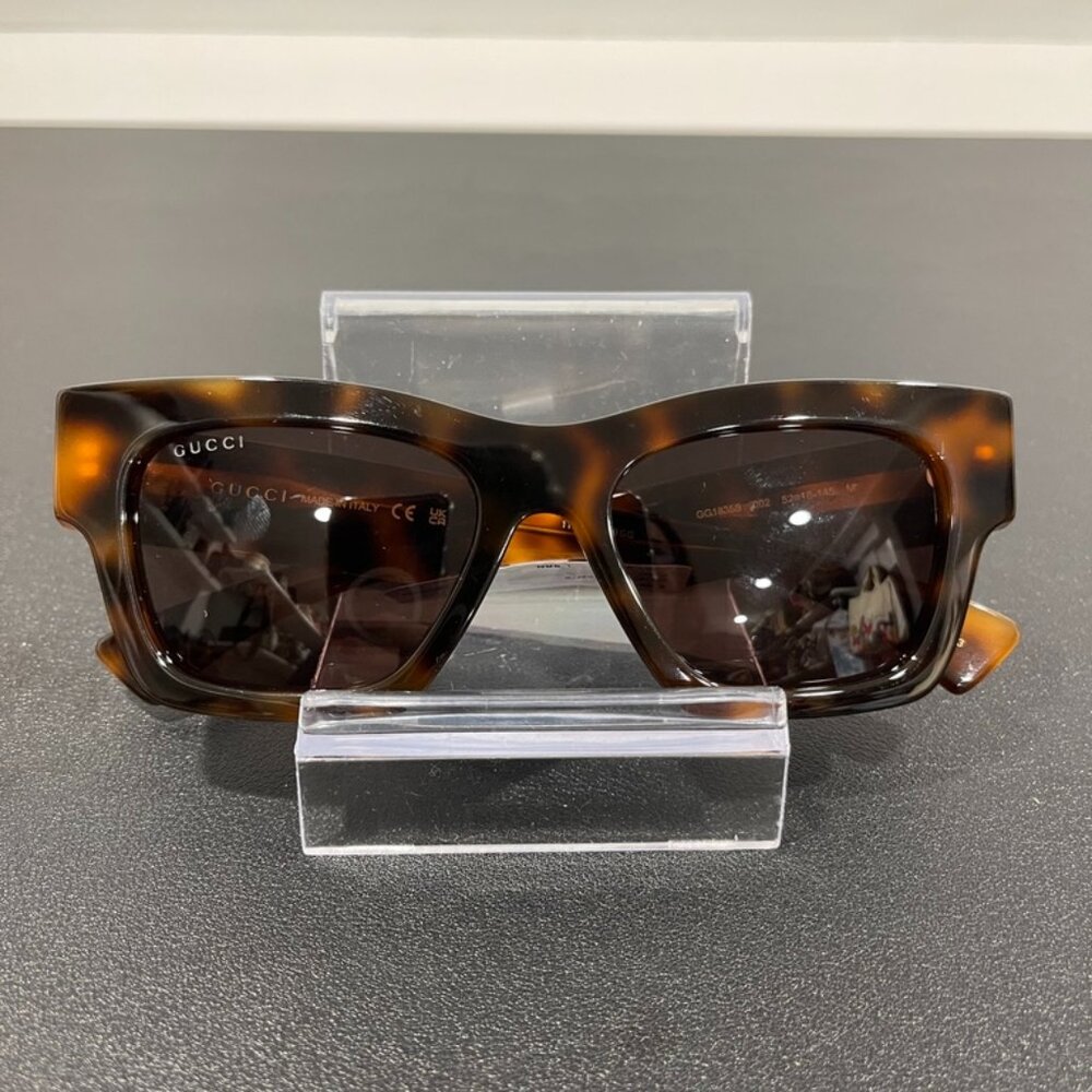 Gucci Women's Tortoise Sunglasses with Gucci Spellout on Arm (JB1398)